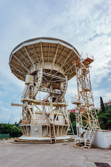 Old rusty abandoned radio telescope satellite dish 