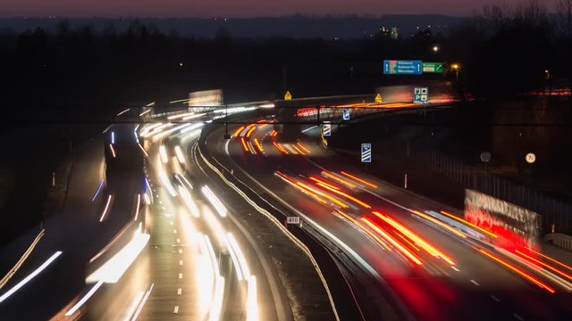 Rush hour on the curvy highway - night car lights timelapse