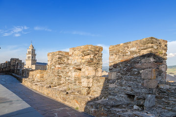 Ponferrada, Spain. Encina Basilica and the fortress wall