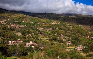 Obraz premium Danba County, Sichuan Province China. Zhonglu Township, Architectural Style of Jiuaju Ancient Tibetan Village. Traditional Tibetan buildings, Suopo towers, beautiful Chinese countryside. Wild West