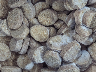 Frozen cutlets in the refrigerator in the store