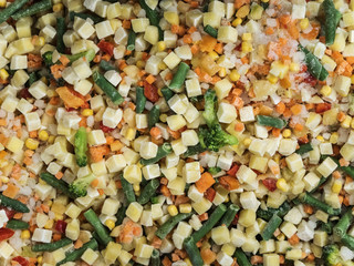 Frozen vegetable mix in a fridge in the store