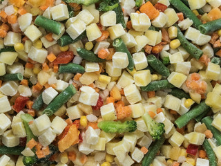 Frozen vegetable mix in a fridge in the store