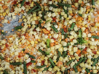 Frozen vegetable mix in a fridge in the store