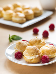 Profiterole on white plate