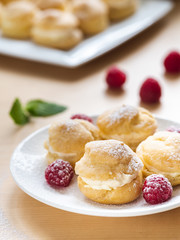 Profiterole on white plate