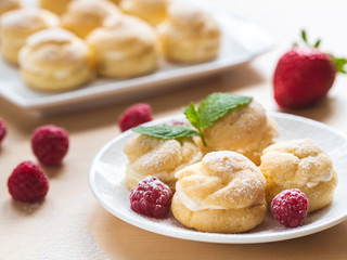 Profiterole on white plate