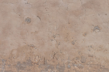 old cracked plaster on the wall