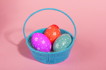 Colorful Easter eggs on pink background. The inscription in Russian with Love. Easter holiday.