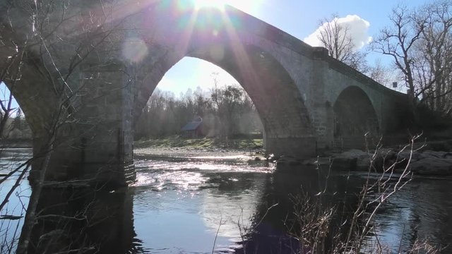 Potarch Bridge against the light with lens flare