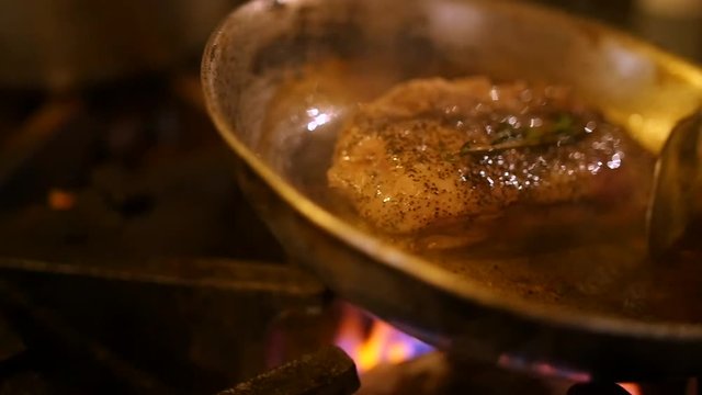 Duck breast is cooked on iron skillet.