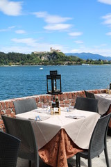 View from Arona to Rocca d'Angera in Angera at Lake Maggiore, Italy