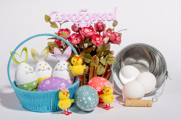 Colorful Easter eggs on white background. The inscription in Russian with Love. Easter holiday.