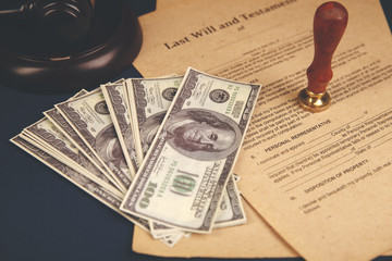 Notary's public pen and stamp on testament and last will. Notary public tools