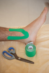 Body taping for support Kinesio Tape, Kinesiology Taping On Man Hand Stock Photo
