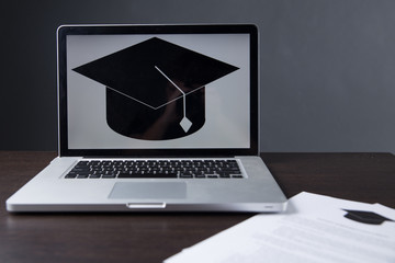 College or university application or letter from school. Student or teacher reading education...