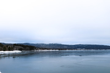 winter landscape with lake and snow