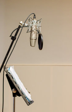microphone and score in recording studio