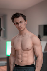 Obraz premium An upper body free bodybuilder with a deflected body and good abs. abdominal muscles, ripped, body, strong