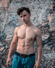 An upper body free bodybuilder with a deflected body and good abs. abdominal muscles, ripped, body,...