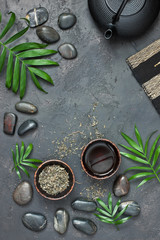 Tea composition with ceramic tea cups and black  teapot
