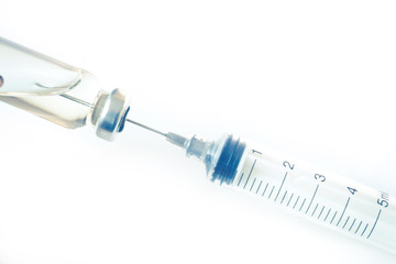 Medical glass vials and syringe for vaccination. Medical concept