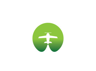 Fototapeta premium Small plane travel agency logo design idea with an airplane across the green circle negative space. Amazing destinations creative symbol trip icon