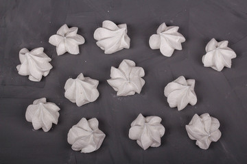 delicious meringue on a gray background