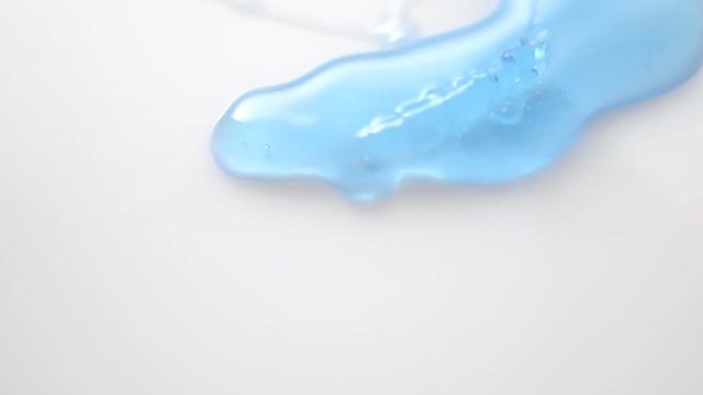 Blue Gel Liquid On White Background Stock Footage.