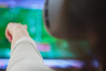 Happy woman getting experience using VR headset glasses of virtual reality- Image