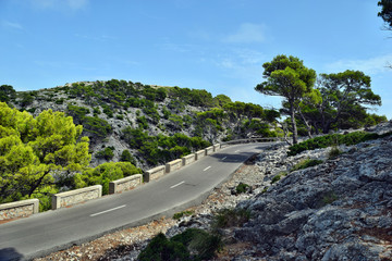 Open coastal road winding through to lighthouse Cap Formentor
