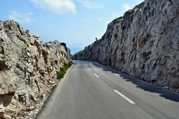 Open coastal road winding through to lighthouse Cap Formentor