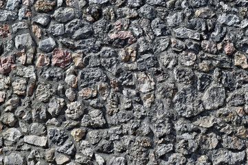 Fototapeta premium Stone wall closeup background