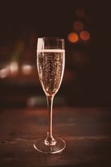 A close up shot of a glass of champagne. Concept of celebration, party, holiday and drinks.