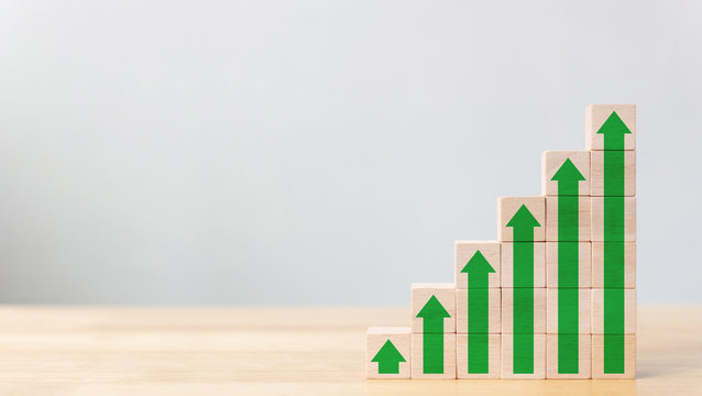 Ladder career path for business growth success process concept.Wood block stacking as step stair with arrow up