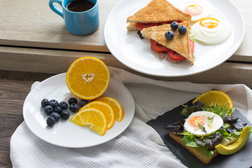 Breakfast - Sandwich with ham and tomatoes on plate