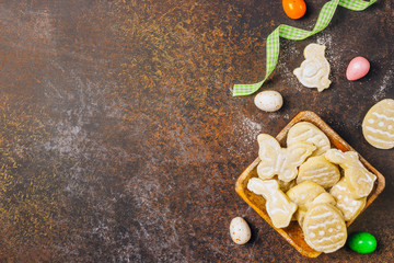 sugar easter cookies with colorful chocolate eggs candy