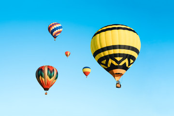 Colorful hot air balloons in the blue sky