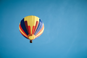 Colorful hot air balloon in the blue sky