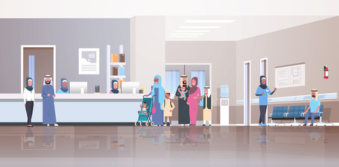 arabic patients in traditional clothes standing line queue at hospital reception desk waiting hall doctors consultation healthcare concept clinic interior full length horizontal flat
