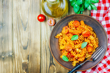 Pasta with sausage in tomato sauce, italian food