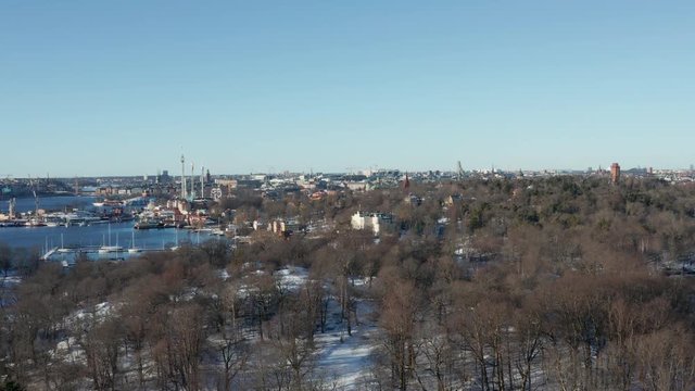 Aerial footage of the beautiful archipelago in Stockholm with a view of islands called Skeppsholmen and Djurg&aring;rden. You can also see Silja Line.