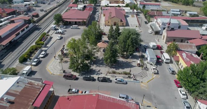 Aerial orbit shot of the center plaza with a kiosk, Creel, Chihuahua, Mexico