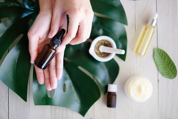 cosmetic nature skincare and essential oil aromatherapy .organic natural science beauty product .herbal alternative medicine . mock up. on wood background 