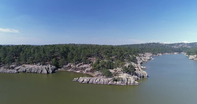 Aerial jib up shot of the Arareco Lake in the Copper Canyon Region, Chihuahua.