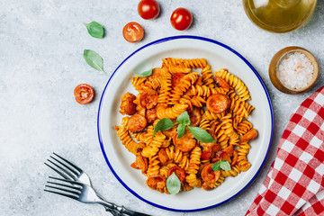Pasta with sausage in tomato sauce, italian food