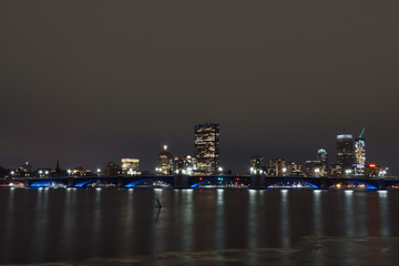 Fototapeta na wymiar Reflection of Boston lights at night from Cambridge side 3