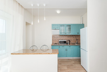 Photo of the light kitchen room