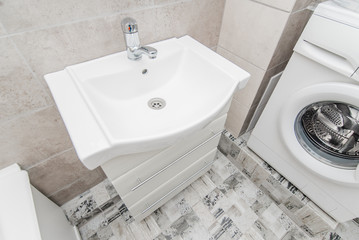 The photo of a sink in a bathroom