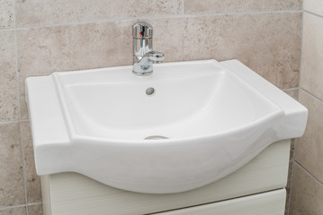 The photo of a sink in a bathroom